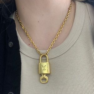 Authentic Louis Vuitton padlock on chain